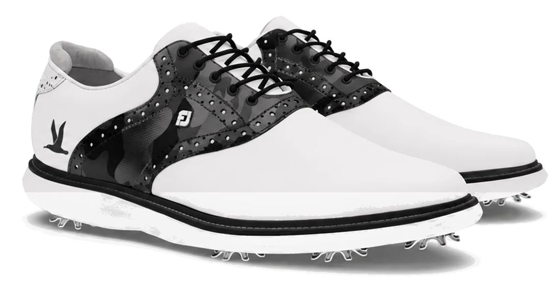 The Traditions Spiked — white and black-camo saddle golf shoes with the seabird at the heel